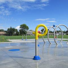 Yellow jet spraying water at splash pad